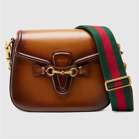 lady web leather shoulder bag gucci|Gucci shoulder bags on sale.